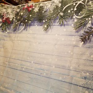 Pine Branches with Snow Backdrop
